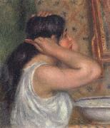 The Toilette Woman Combing Her Hair renoir